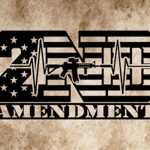May include: A black metal wall art piece featuring the text 2ND AMENDMENT. The number 2 is designed with the American flag pattern, while the letter D incorporates a heartbeat line and a rifle silhouette. The word AMENDMENT is below.