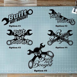 May include: Five different design options for a black and white decal that reads "Built Not Bought". The decal features a wrench design.
