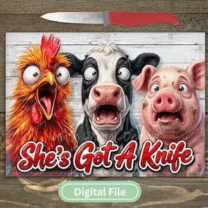 May include: A rectangular glass chopping board featuring a cartoon illustration of a shocked chicken, cow, and pig against a white wood background. The text "She's Got A Knife" is printed in red at the bottom, with a red-handled knife placed above.