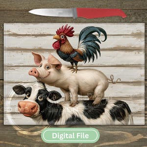 May include: A rectangular glass cutting board featuring a cartoon illustration of a black and white cow, a pink pig standing on the cow, and a rooster perched on the pig, set against a white wood plank background with a red-handled knife above.