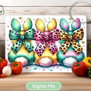 "Bright leopard print bunny butts sublimation PNG with colorful bows, perfect for Easter cutting boards, kitchen decor, and spring sublimation projects."