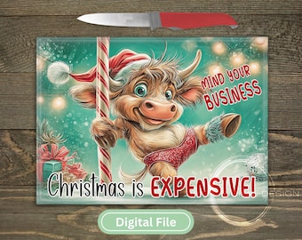 May include: A decorative cutting board with a cartoon bull wearing a Santa hat and a red outfit, holding a candy cane. The board has the text "Christmas is EXPENSIVE!" and "MIND YOUR BUSINESS". A knife is above the board.