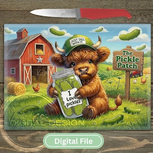 May include: A digital illustration of a brown Highland cow wearing a green hat that says "Just Dill With It." The cow holds a jar of pickles labeled "I love pickles." A red barn and a sign that says "The Pickle Patch" are in the background. A red knife is at the top.