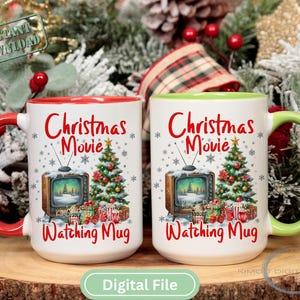 May include: Two white ceramic mugs with red and green handles, featuring a Christmas theme. Each mug displays the text "Christmas Movie" and "Watching Mug", along with a vintage TV, Christmas tree, and gifts.