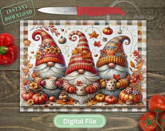 May include: A rectangular glass cutting board featuring a festive autumn illustration of three gnomes wearing striped hats, holding mugs, and surrounded by pumpkins and fall leaves. The border has a brown and white plaid pattern.