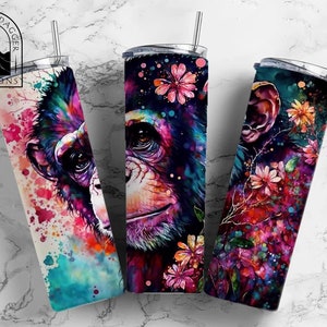 May include: Three stainless steel tumblers with colorful watercolor designs featuring a chimpanzee and flowers. The tumblers are 20 ounces and have a double-wall insulated design.