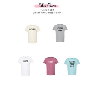 May include: Color chart for unisex fine jersey t-shirts in the colors natural, heather grey, white, cassis, and heather purist blue. The chart is labeled "Color Chart", "TULTEX 202", and "Unisex Fine Jersey T-Shirt".
