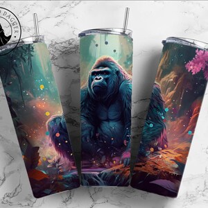 May include: A stainless steel tumbler with a colorful design featuring a gorilla sitting in a jungle setting. The design includes a variety of colors, including green, blue, purple, and orange. The gorilla is depicted in a realistic style, with detailed fur and facial features.