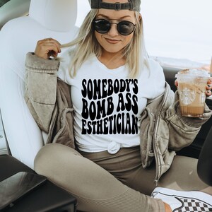 Somebody&#39;s Bomb Ass Esthetician Shirt