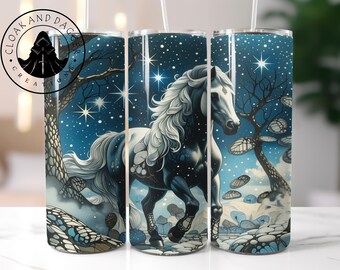 May include: A tumbler featuring a fantasy design with a white horse against a starry night sky. The horse has a flowing white mane and is set against a backdrop of stylized trees and a snowy landscape. The tumbler has the text "CLOAK AND DAGGER CREATIONS".