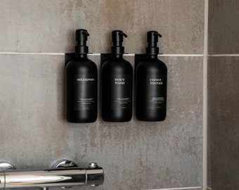 Shower dispenser set including self-adhesive wall brackets and bottles (all black edition) I Soap dispenser made of glass in matt black