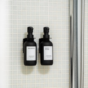 Shower dispenser set including self-adhesive wall brackets and bottles I soap dispenser made of glass in matt black I dispenser bottle with label
