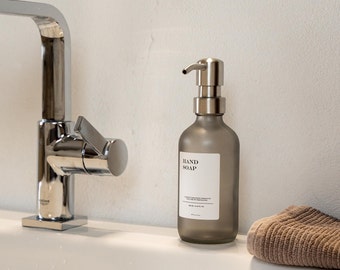 Dispensador de jabón de vidrio en color gris mate - frasco dispensador con etiqueta impermeable - frasco de farmacéutico