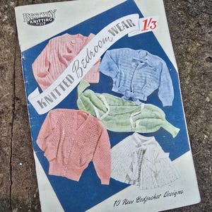 May include: Vintage Bestway Knitting pattern book featuring illustrations of knitted bedroom wear. The cover displays various pastel-colored knitted cardigans and a blue banner with the text "Knitted Bedroom Wear". The book is titled "10 New Bedjacket Designs".