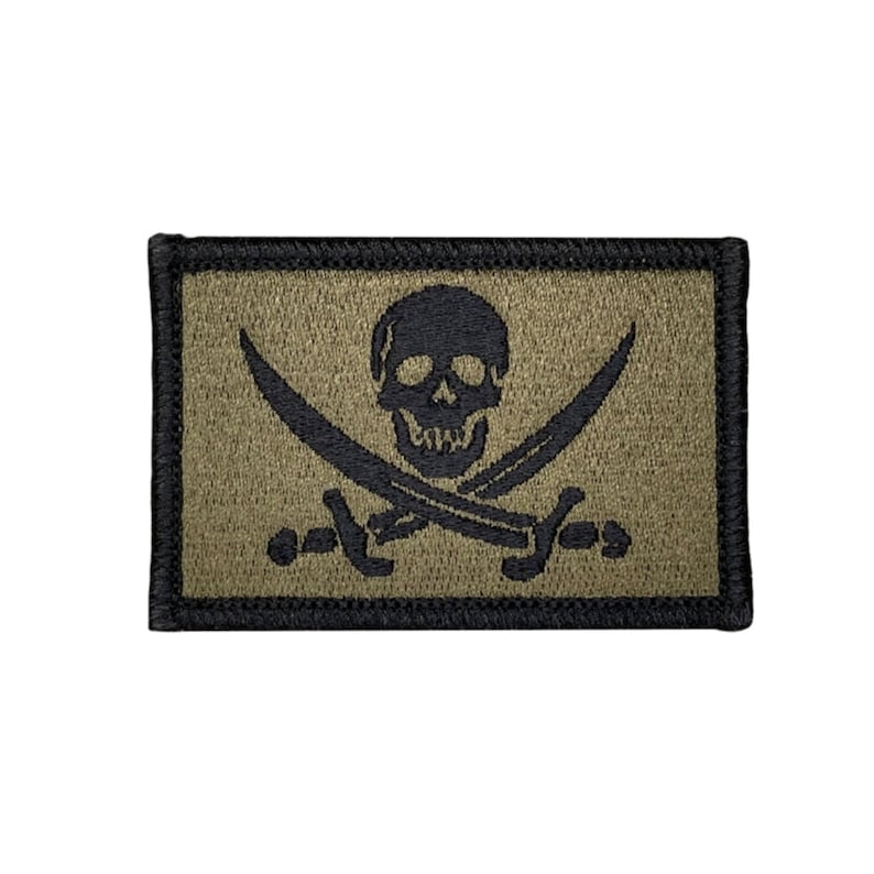 Calico Jack Rackham olive drab jolly roger pirate flag. 2x3 inch morale badge velcro tactical hook and loop. Made in USA