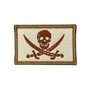 Calico Jack Rackham desert tan jolly roger pirate flag. 2x3 inch morale badge velcro tactical hook and loop. Made in USA