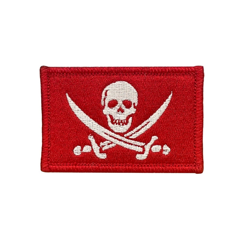 Calico Jack Rackham red jolly roger pirate flag. 2x3 inch morale badge velcro tactical hook and loop. Made in USA