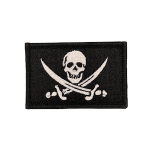 Calico Jack Rackham black jolly roger pirate flag. 2x3 inch morale badge velcro tactical hook and loop. Made in USA