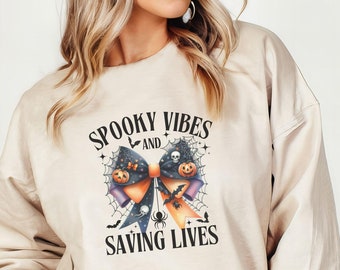 Halloween Nurse Sweatshirt, Fall Nurse Crewneck, ER Nurse Halloween Sweatshirt, Spooky Vibes Bow RN Sweatshirt, MICU Nursing Student Gift