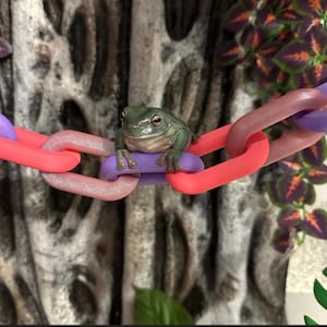 May include: A rustic wooden sign with the text "Welcome to our home" in white lettering. The sign has a distressed finish and a simple, inviting design, ideal for entryway decor.