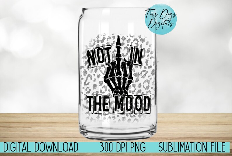 May include: A white can with a black and white leopard print design. The can has black text that reads "Not in the mood" with a black skeleton hand giving the middle finger.