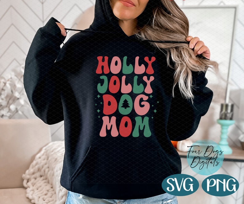May include: Black hoodie with a red, green, and pink graphic that says "Holly Jolly Dog Mom" with a small green Christmas tree graphic.