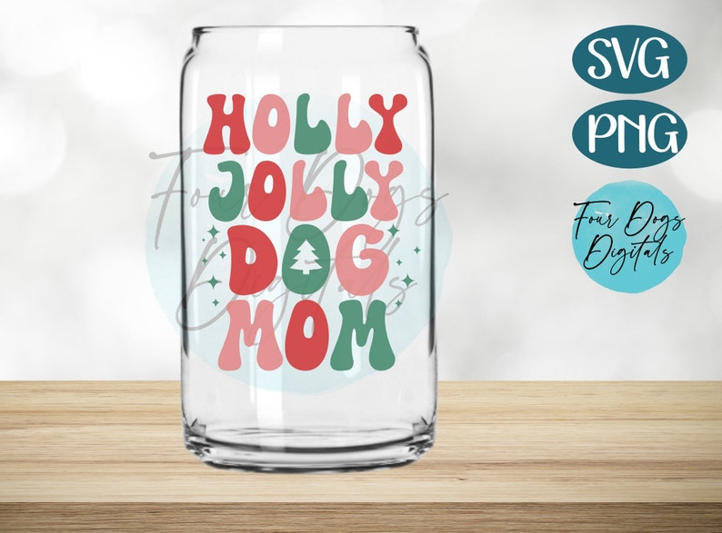 May include: A clear glass tumbler with a red, green, and pink design that says "Holly Jolly Dog Mom".