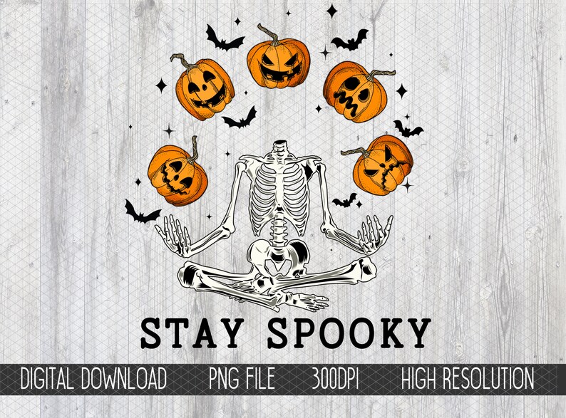 May include: A skeleton in a yoga pose with the text "STAY SPOOKY" below. The skeleton is surrounded by six orange jack-o'-lantern pumpkins and black bats.