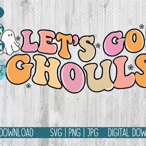 May include: Let's Go Ghouls text in a retro font with pink, orange, and yellow colors. A ghost with a witch's hat is on the right side of the text.