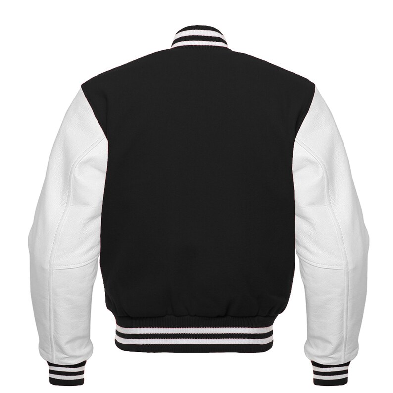 May include: A black and white varsity jacket with white leather sleeves. The jacket has a ribbed collar, cuffs, and waistband.