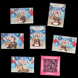 May include: Six 4x6 inch magnets with a photo of a baby boy dressed as a pilot with the words "Top Gun Maverick" on each magnet. The magnets are surrounded by blue, red, and white balloons and stars. A pink magnet with a QR code and the text "To order scan here! Mavery Design Thank You! Mavery Design" is in the bottom right corner.