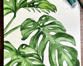 Handmade watercolor painting of a set of Monstera leaves