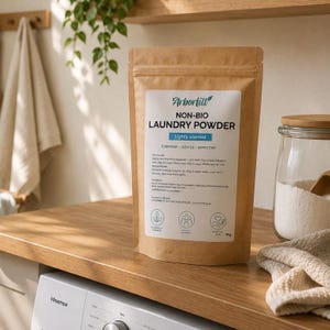 May include: A brown paper stand-up pouch of Arborfill non-bio laundry powder. The white label features the text Arborfill, Non-Bio Laundry Powder, Lightly Scented, Everyday, Gentle, Effective, and includes three circular icons at the bottom.