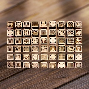 Spessore 3mm e 2mm.Modello taglio laser di 54 scatole e bomboniere in legno .Formato SVG DXF. 54 box templates, party favors, digital files.