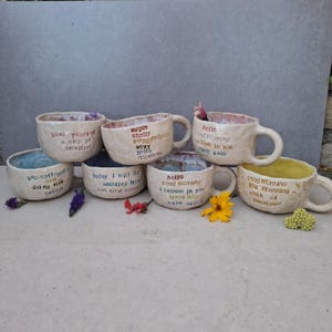 Handmade Philosopho-Pottery Cup.  Fun rainbow word phrases. Send Morning Mo-tea-vation & Positivi-tea to your Bes-tea. Swirly glaze interior