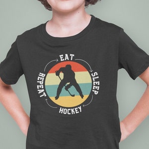 Eat, Sleep, Hockey Repeat Unisex Youth Hockey Fan T-shirt, Hockey Player Gift, Hockey Lover Shirt, Hockey Team Gifts, Funny Hockey Shirt
