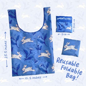 May include: A blue reusable foldable bag with a white rabbit pattern, measuring 25.5 inches tall and 15.5 inches wide. The bag is shown folded and unfolded, with the text "AMBREWART" and "Reusable Foldable Bag!"