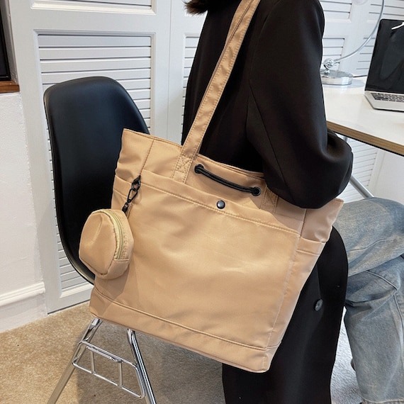 Nylon shopper bag with pockets