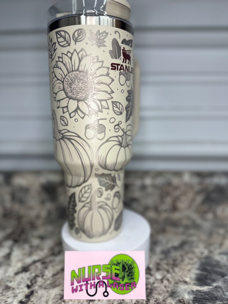 Sunflower Stanley. Custom laser etched Stanley with sunflowers, pumpkins, and acorns. Stanley laser etched custom tumbler. Custom Stanley. Sunflower Stanley. Fall vibe custom sunflower cup. Sunflower mug. floral tumbler cup.