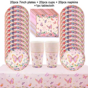 May include: A party set with pink plates, cups, napkins, and a tablecloth. The plates are 17.78 cm in diameter and decorated with butterflies and floral designs. The set includes 20 plates, cups, napkins, and a tablecloth.