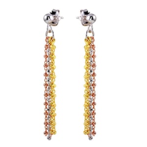 May include: A pair of dangle earrings with silver posts. Each earring features three strands of small, linked beads in gold, silver, and rose gold colors. The earrings are displayed against a white background.