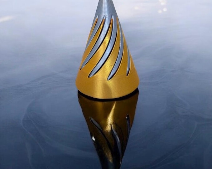 Large Impossible fidget cone, can be calming, relaxing, Soothing and fascinating to look at. Keeps kids occupied.