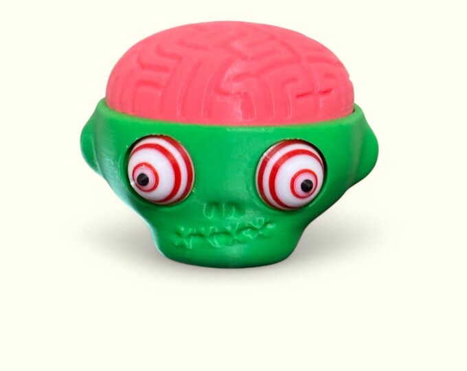 Quirky dazed Zombie herb grinder, quirky and a talking point. Ideal gift