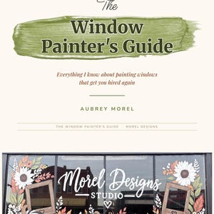 May include: A book cover titled The Window Painter's Guide by Aubrey Morel, featuring a green brushstroke background. Below, a window display shows the text Morel Designs Studio with painted sunflowers, pumpkins, and wooden frames.