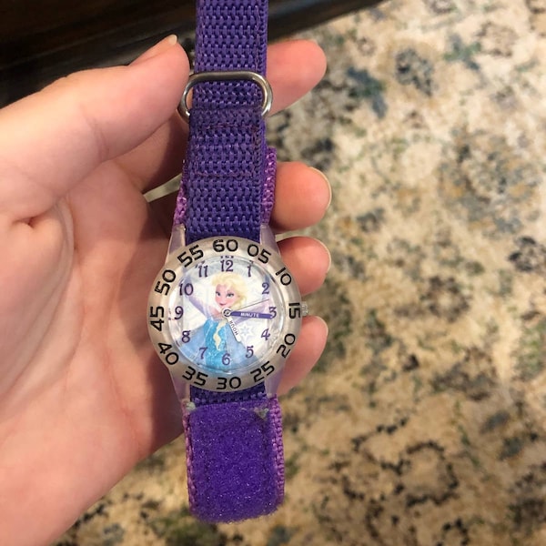 Disney Frozen Kids’ Plastic Time Teacher Analog Quartz Nylon Watch