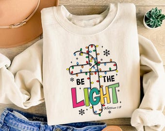 Be The Light Sweatshirt, Christmas Religious Shirt For Family, Christmas Lights Sweater, Faith Shirt, Bible Verse Shirt