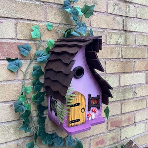 Wooden bird house with fairy door, windows and toadstool.  Whimsical hand painted birthday, house warming gift.