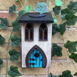 Solar Fairy House, Solar Powered Wooden Garden Cottage, Light Up Whimsical Decor, Illuminated Fairy Garden House with Sparkly Door & Lantern Glittering blue