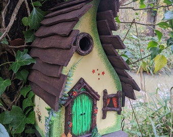 Whimsical Yellow wooden bird house Sparrow nesting box with Green fairy door, Birthday gift for mum, Outdoor decoration Present for Gardener