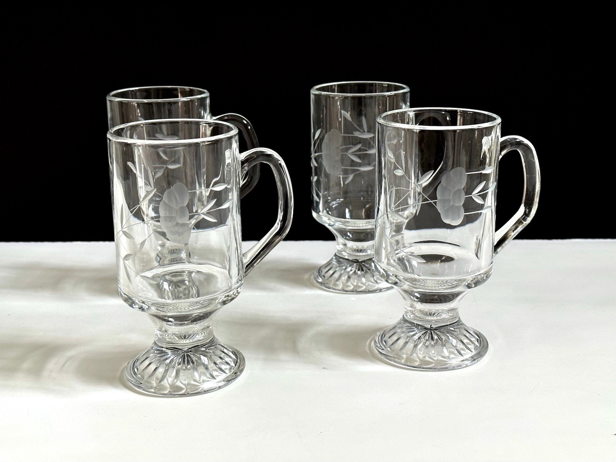 Footed 2024 glass mug